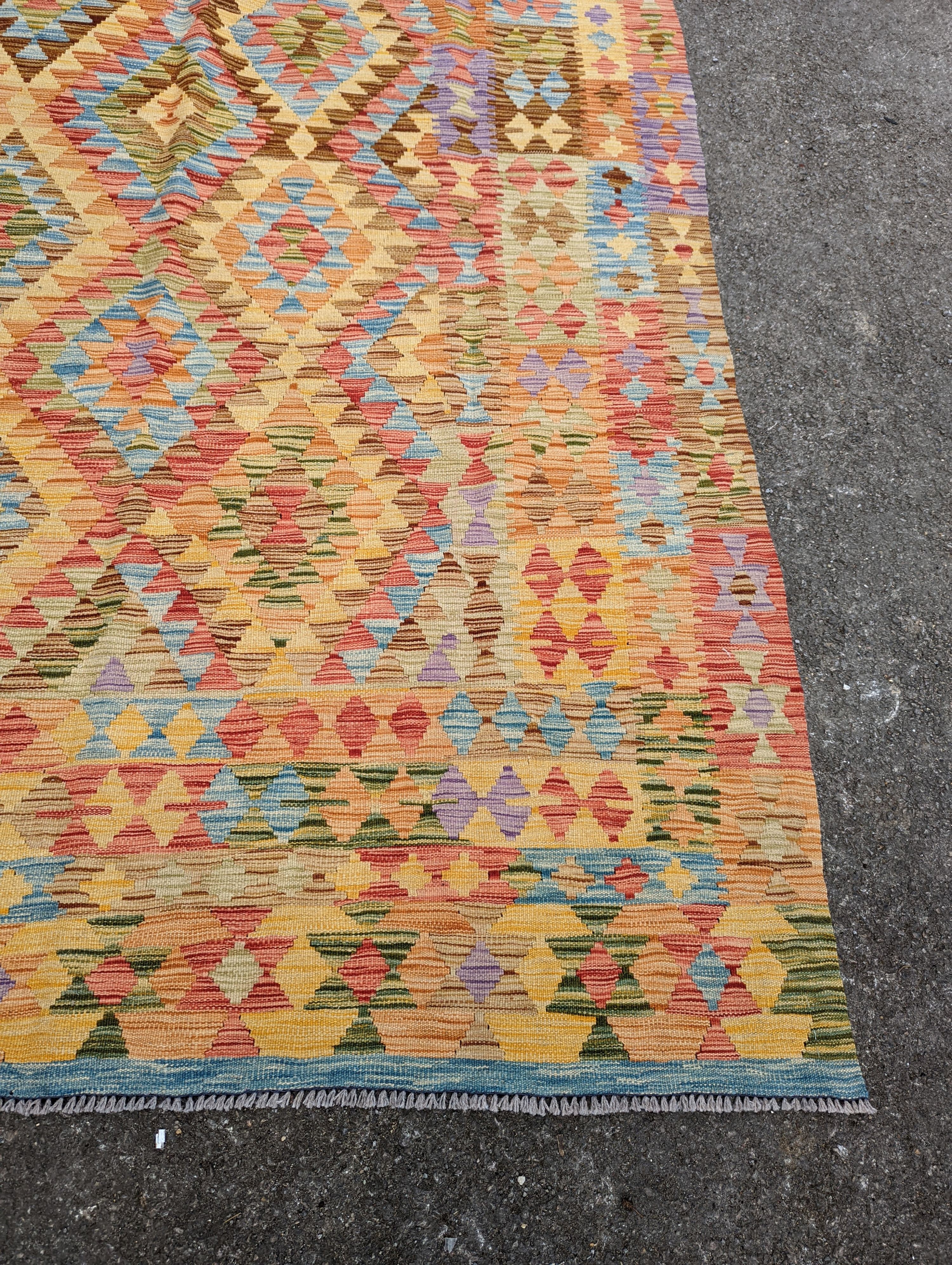 A contemporary Anatolian design Kilim flatweave carpet, approx. 300 x 200cm